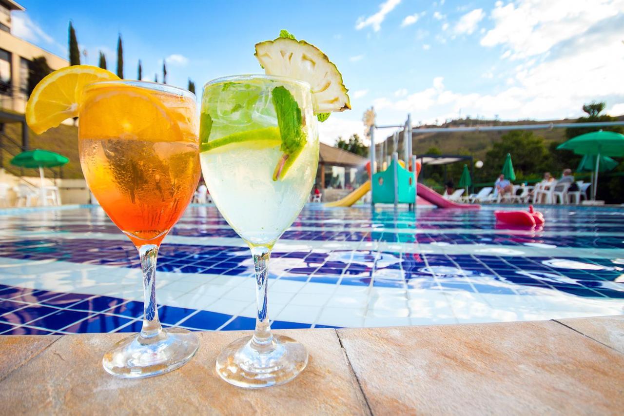 Hotel Golden Park All Inclusive Pocos De Caldas By Nacional Inn エクステリア 写真 Two Aperol Spritz cocktails